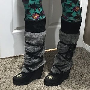 Moccasin style heeled boots